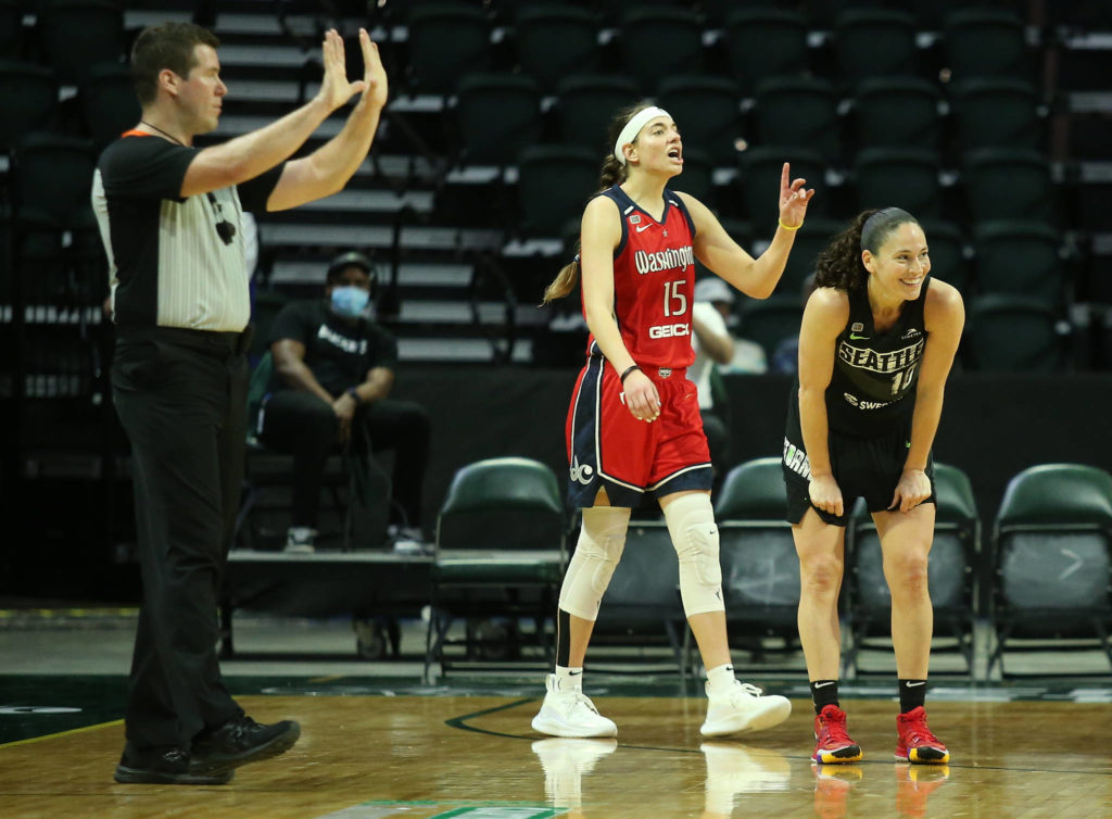 The Storm’s Sue Bird laughs after being called for a foul during a game against the Mystics on Tuesday evening at Angel of the Winds Arena in Everett. (Andy Bronson / The Herald)
