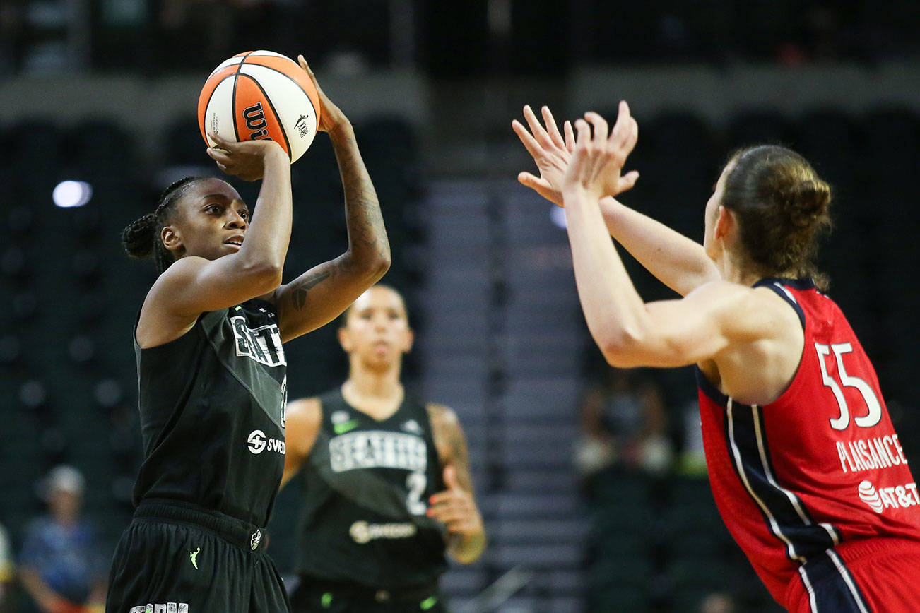 Seattle Storm's Jewell Loyd throws up a shot, eventually passing the 3,000 point career mark, as the Seattle Storm take on the Washington Mystics at the Angel of the Winds Arena on Tuesday, June 22, 2021 in Everett, Washington. (Andy Bronson / The Herald)