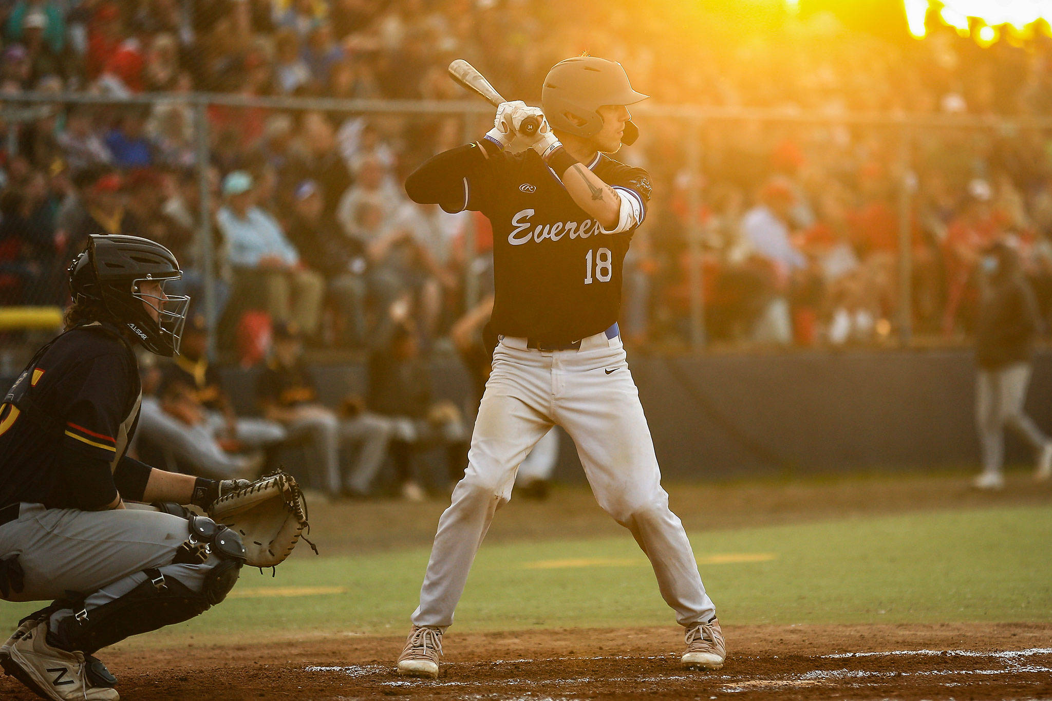 The Merchants’ Cam Keller bats during the 116th Midnight Sun Game against the Goldpanners on June 21 in Fairbanks, Alaska. (Photo by Justin Prax)