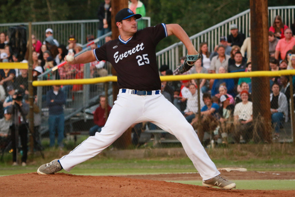 Merchants pitcher Jared Maxfield throws to a Goldpanners hitter during the 116th Midnight Sun Game on June 21 in Fairbanks, Alaska. (Photo by Justin Prax)
