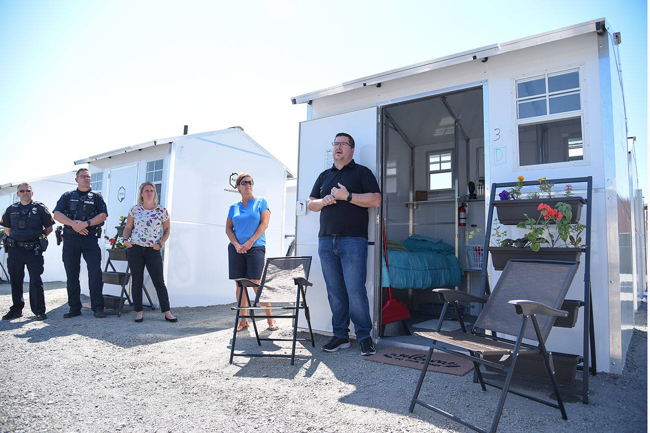 Patrick Diller, head of community partnerships for Pallet, discusses the Pallet Shelter Pilot Project on Tuesday, June 29, 2021 in Everett, Washington. (Katie Hayes / The Herald)