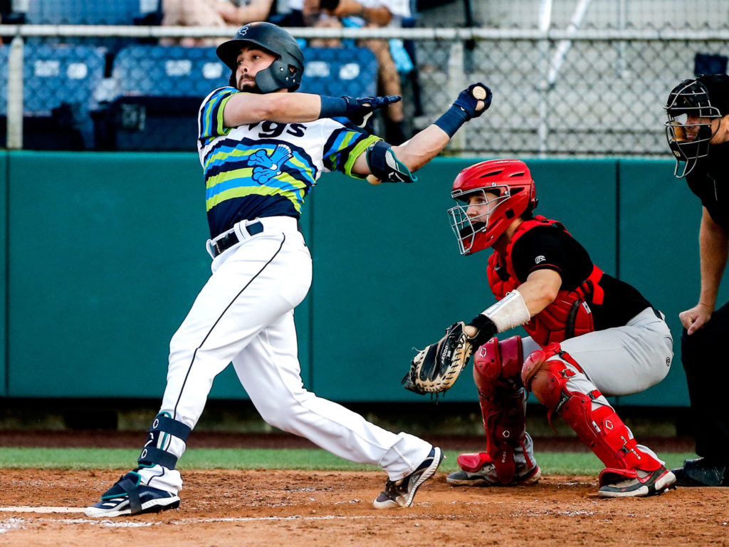 The AquaSox’s Zach DeLoach doubled in the third inning of a game against Canadians on Tuesday evening at Funko Field in Everett. (Kevin Clark / The Herald)

