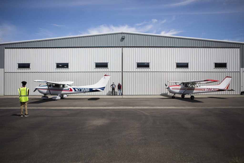 Red-Tailed Hawks Flying Club members ready to taxi to the runway at Arlington Municipal Airport. (Olivia Vanni / The Herald)
