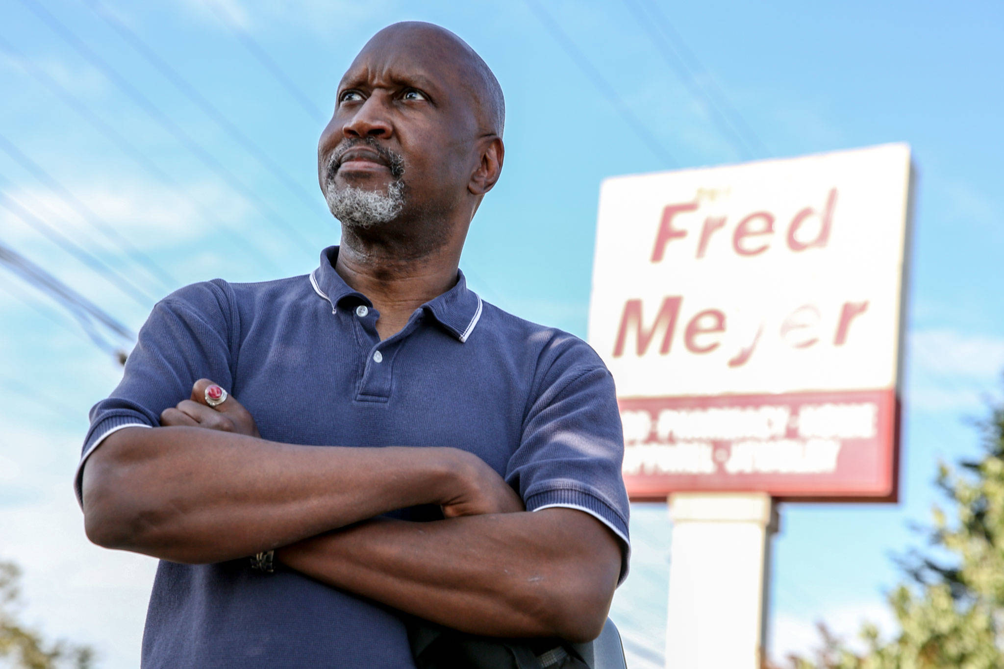 Wil Peterson is a cashier at Fred Meyer in Everett, but he won’t receive the temporary $4 per hour hazard pay increase that many grocery workers in unincorporated Snohomish County will receive. (Kevin Clark / The Herald)