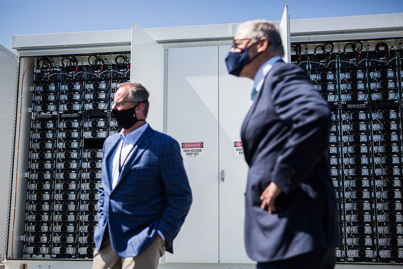 Snohomish County PUD's innovative solar battery powered microgrid batteries sit in their enclosed units during a visit by Governor Jay Inslee on Tuesday, April 20, 2021 in Arlington, Wash. (Olivia Vanni / The Herald)