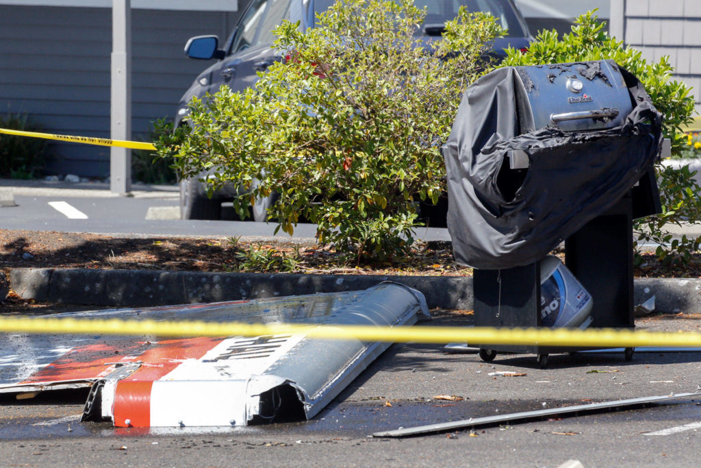A U-Haul truck exploded in the parking lot of the Edmonds Center for the Arts on Tuesday afternoon. (Kevin Clark / The Herald)
