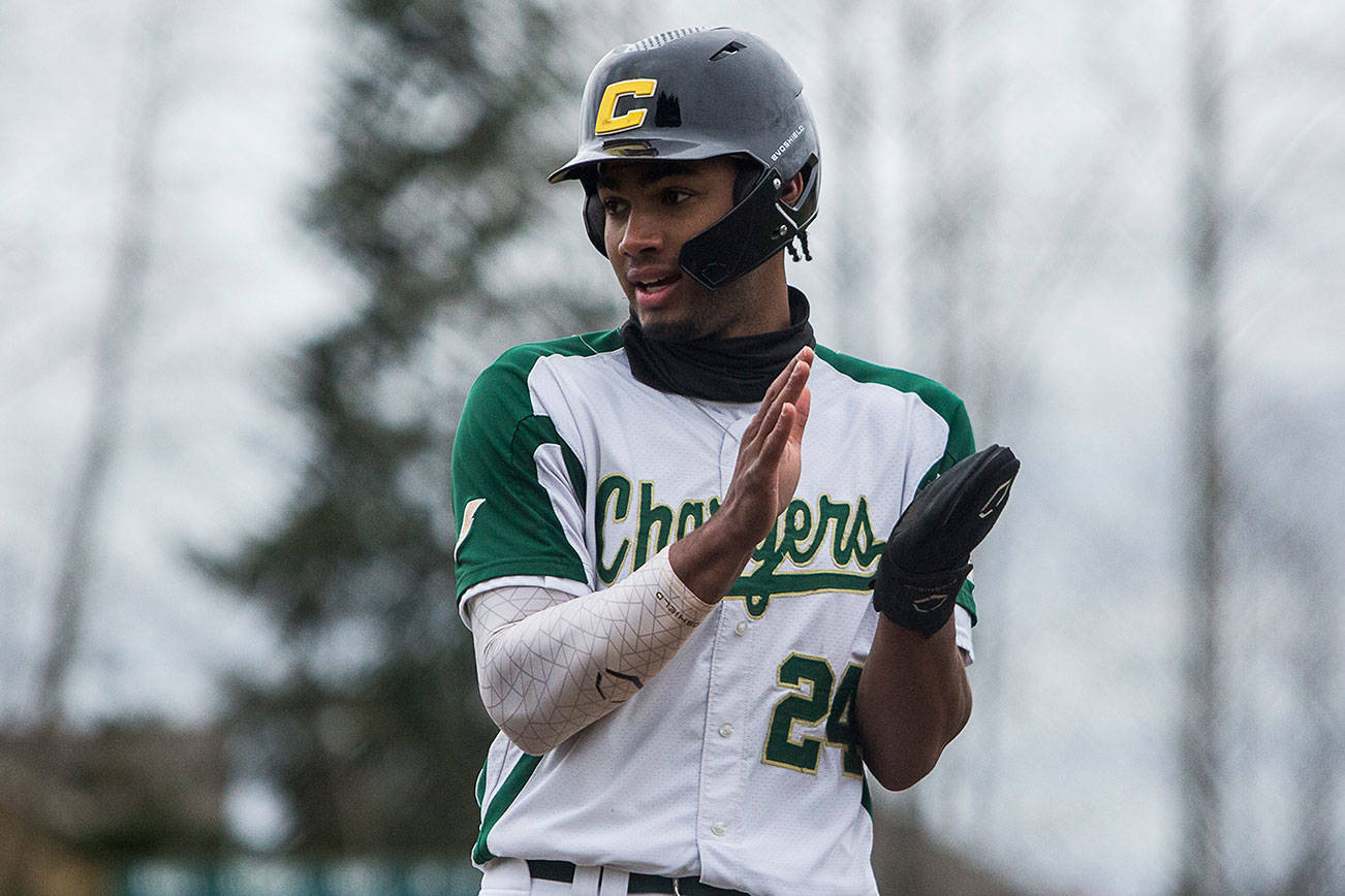 Marysville Getchell Malachi Knight claps after making it to third base during the game against Marysville Pilchuck on Wednesday, April 7, 2021 in Marysville, Wa. (Olivia Vanni / The Herald)