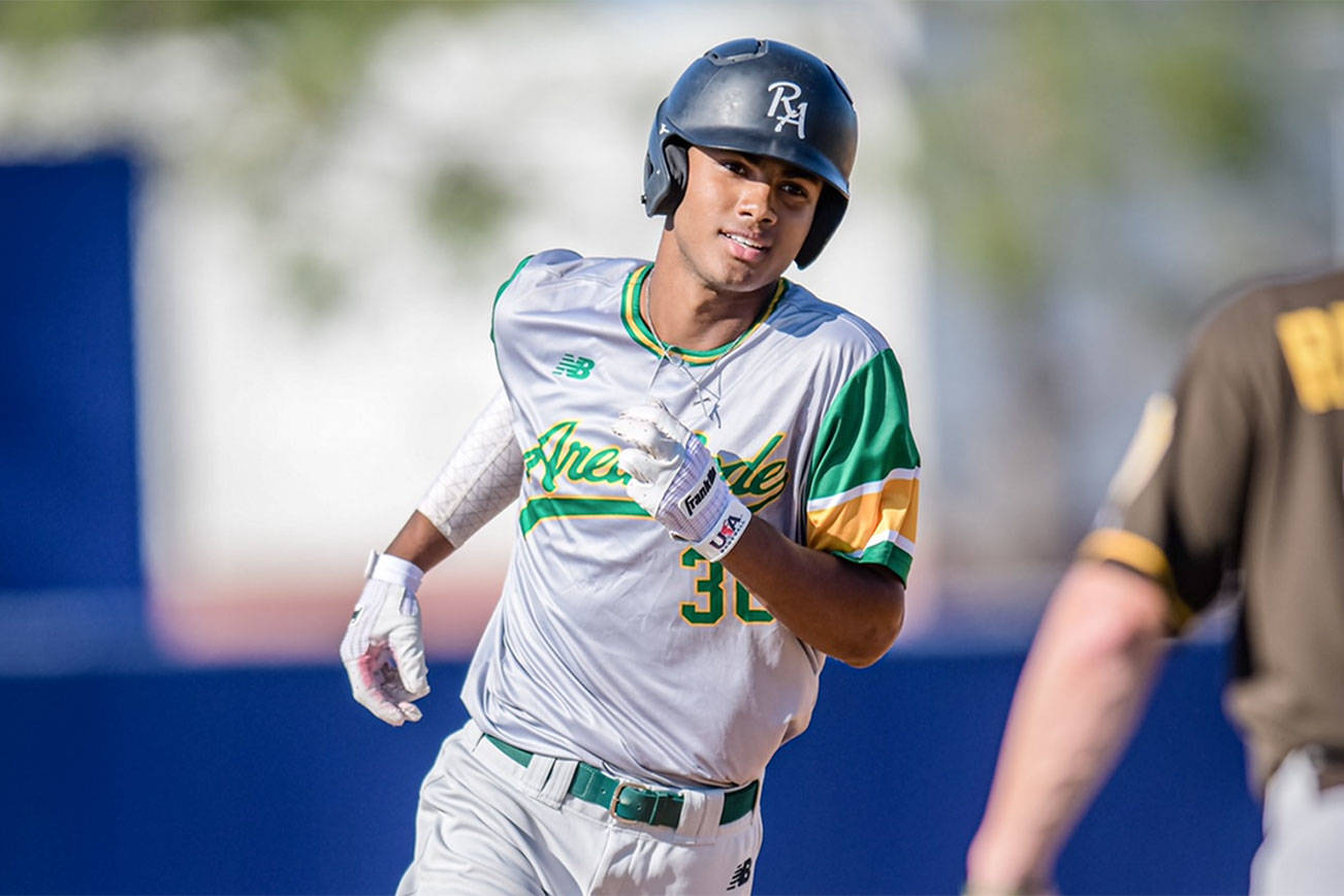 Malakhi Knight rounds third base during a game. (Photo courtesy of Malakhi Knight)