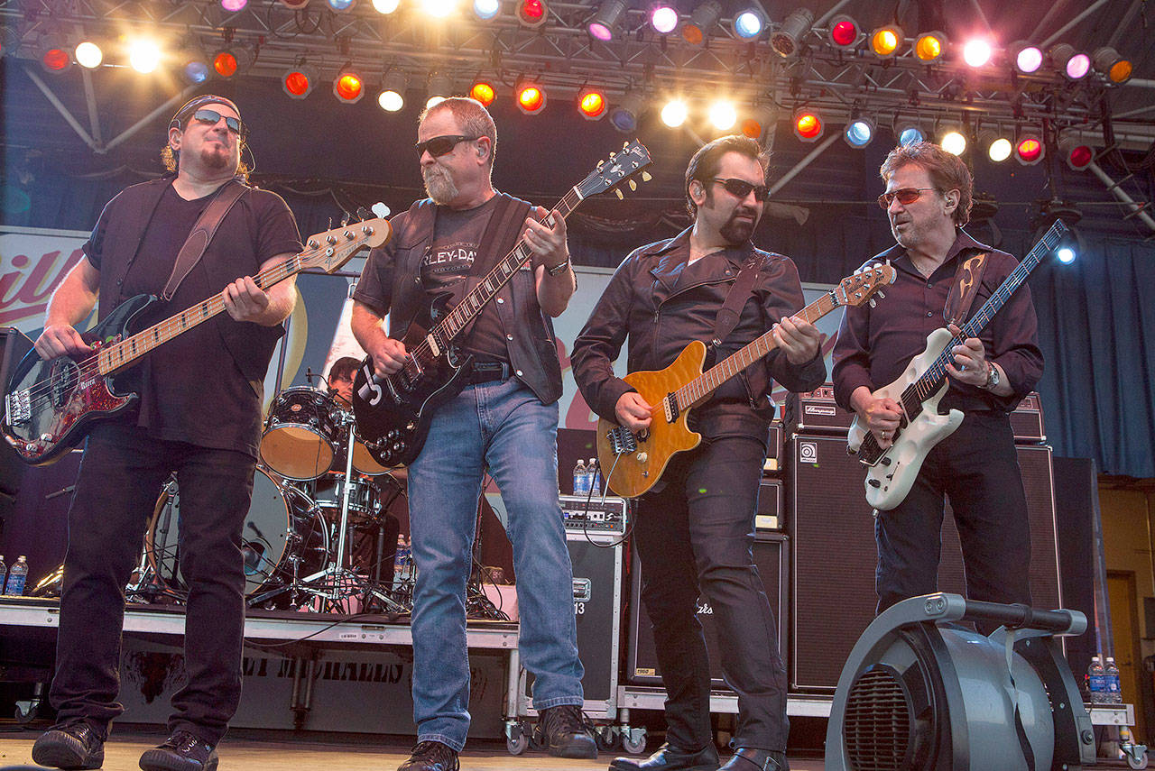 Danny Miranda, Eric Bloom, Richie Castellano and Donald Brian "Buck Dharma" Roeser of Blue Öyster Cult perform at the Harley-Davidson 110th Anniversary celebration, on Thursday, August 29, 2013 in Milwaukee, WI. (Photo by Barry Brecheisen/Invision for Invision/AP)