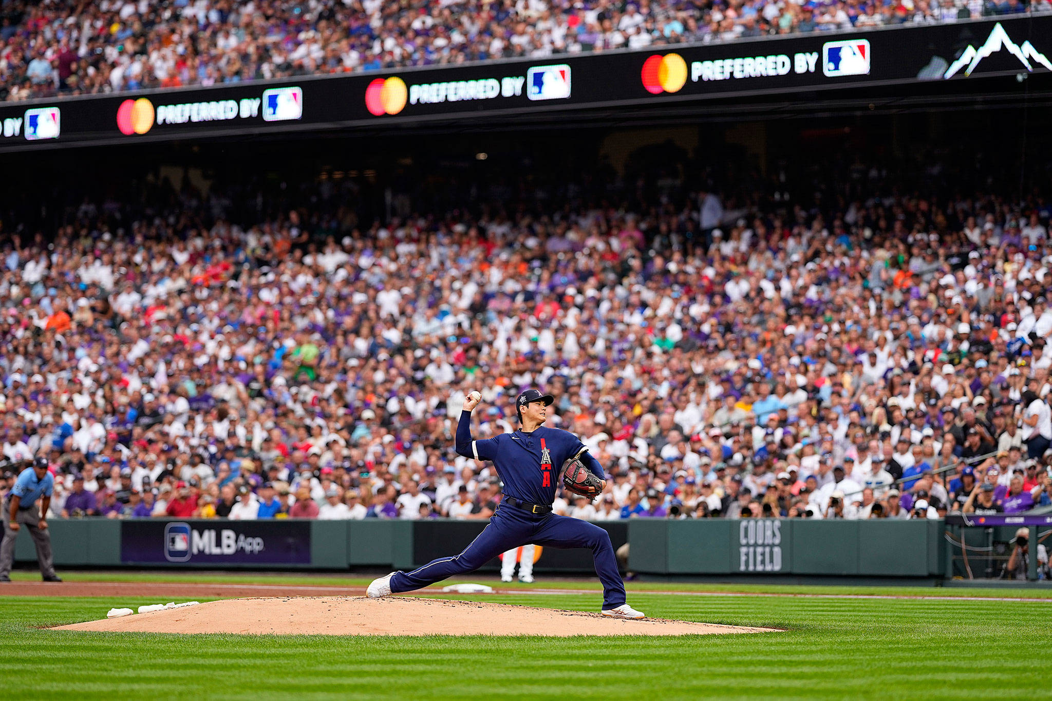 American League starting pitcher Shohei Ohtani throws during the first inning of the MLB All-Star Game on Tuesday in Denver. (AP Photo/Jack Dempsey)
