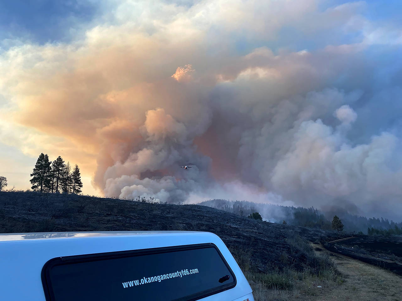 Firefighters monitor retardant drops on the Cub Creek 2 Fire near Mazama. (Okanogan County Fire District 6)