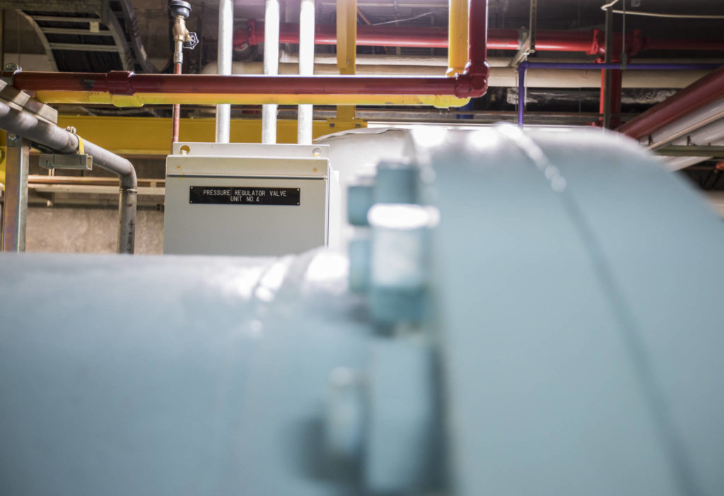 The pressure regulator valve and one of two Francis turbines that provide power to the City of Everett at the Jackson Powerhouse in Sultan. (Olivia Vanni / The Herald)
