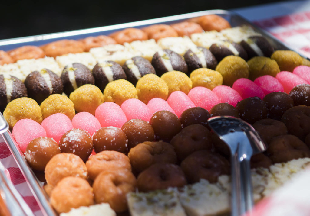A tray of colorful desserts at the Eid ul Adha celebration Saturday in Snohomish. (Olivia Vanni / The Herald)

