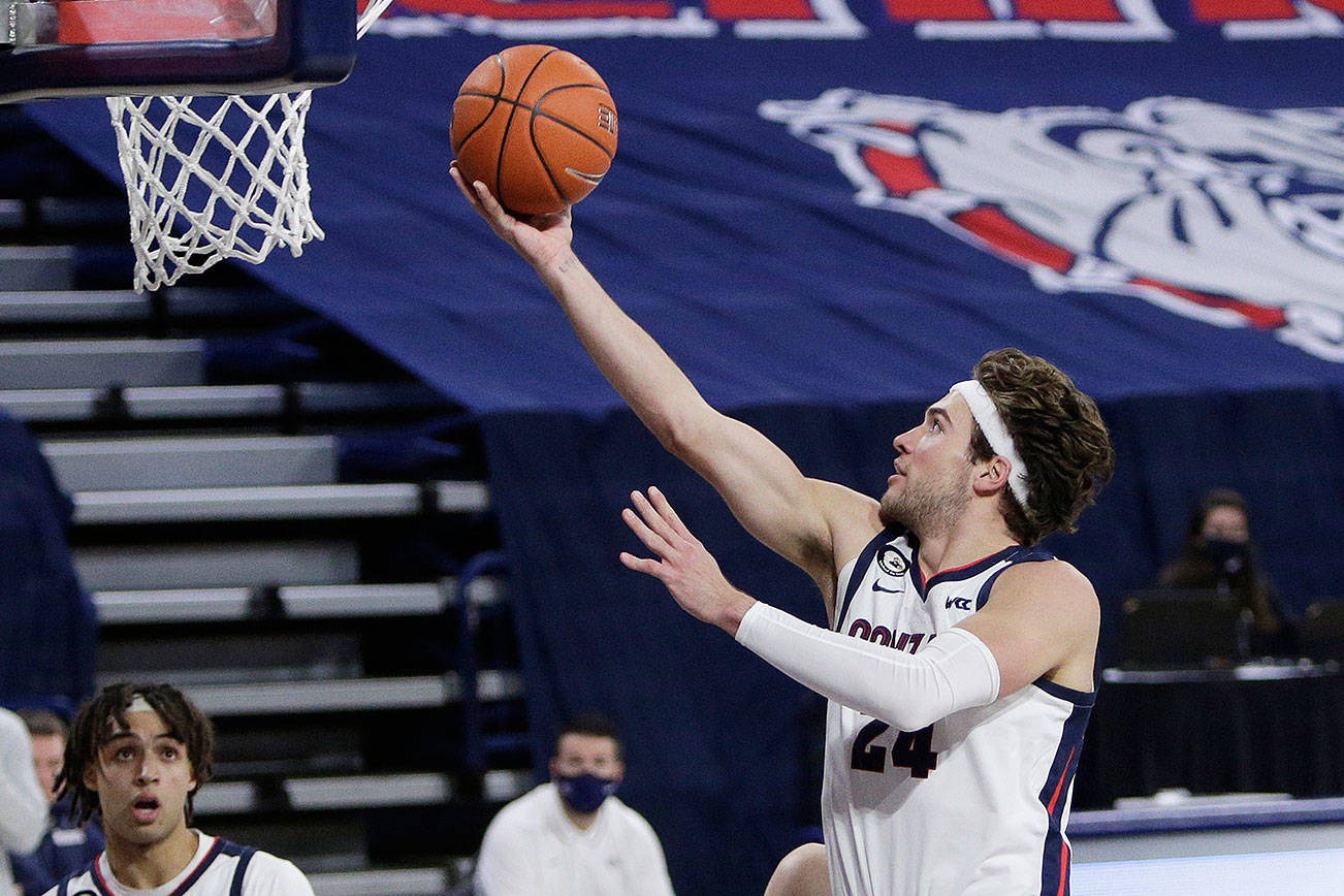 Gonzaga forward Corey Kispert shoots during the second half of an NCAA college basketball game against Dixie State in Spokane, Wash., Tuesday, Dec. 29, 2020. Gonzaga won 112-67. (AP Photo/Young Kwak)