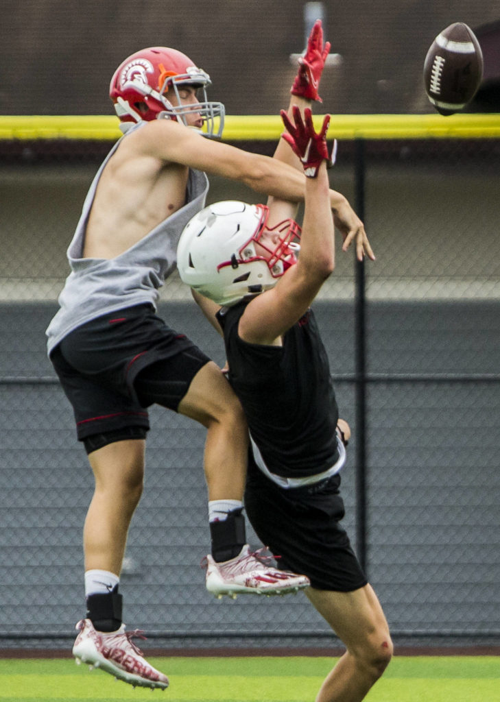 Standwood’s Carson Beckt blocks a pass during the Cougars Championship Passing Tournament at Lakewood High School on July 31 in Arlington. (Olivia Vanni / The Herald)