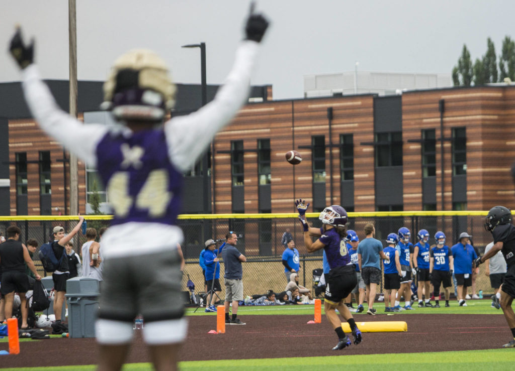 Lake Stevens’ Drew Carter makes a catch for a touchdown during the Cougars Championship Passing Tournament at Lakewood High School on July 31 in Arlington. (Olivia Vanni / The Herald)