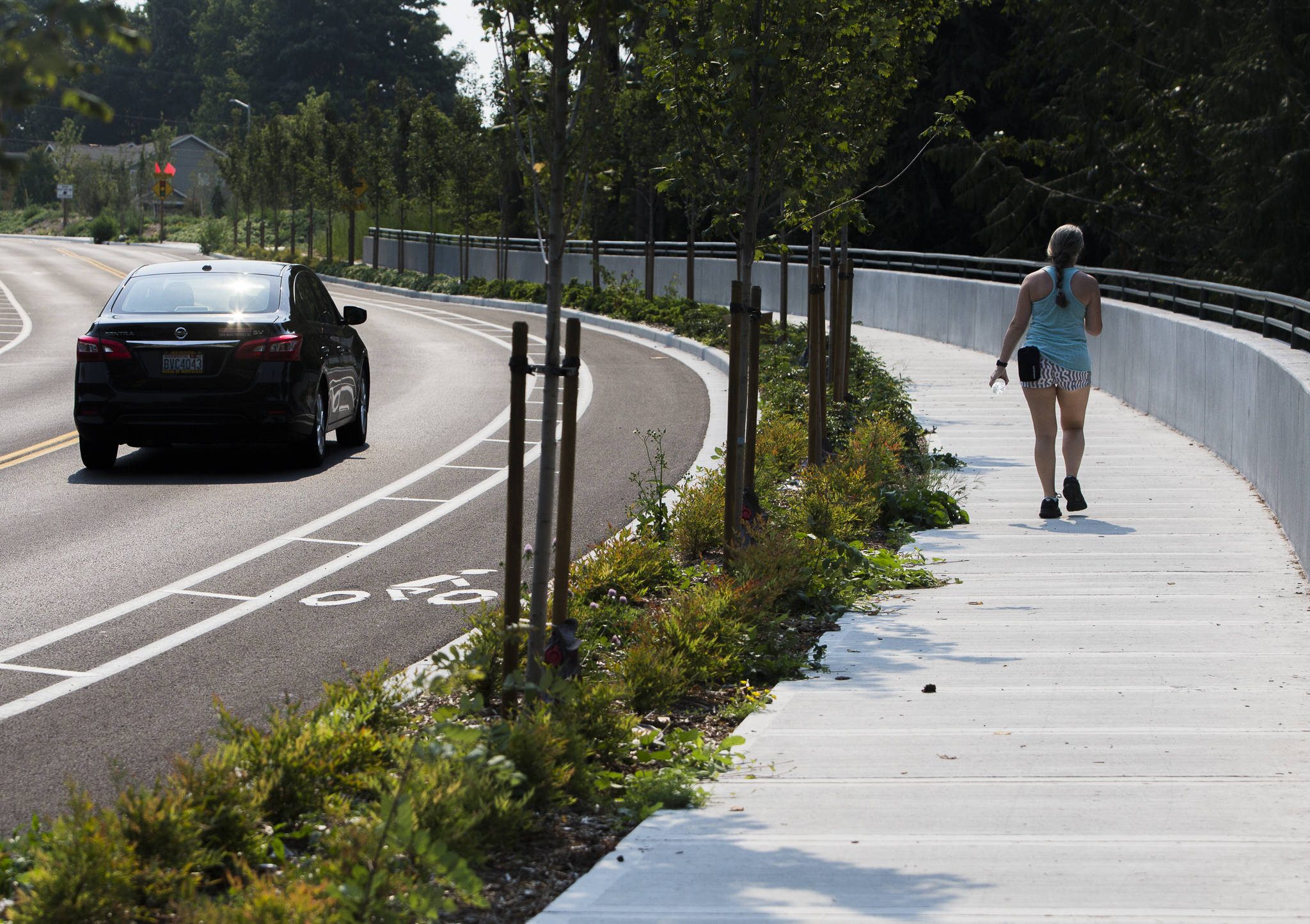 Cars, cyclists and pedestrians can use the newly opened Harbour Reach Drive, a north-south road that parallels a 0.70-mile stretch of Highway 525/Mukilteo Speedway, on Thursday in Mukilteo. (Olivia Vanni / The Herald)