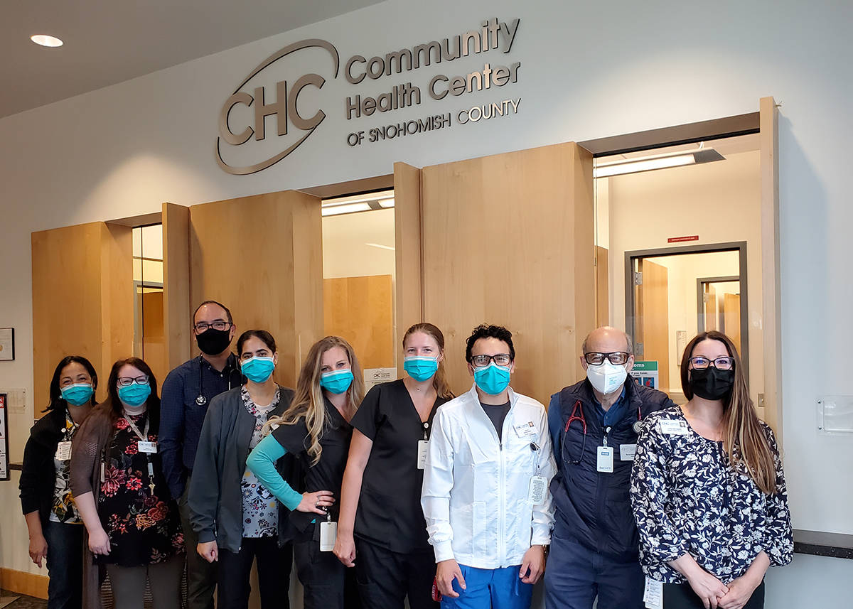 Practice Manager Lydia Alexander with the staff of providers, MAs and receptionists at Community Health Center of Snohomish County’s Everett-College Clinic.