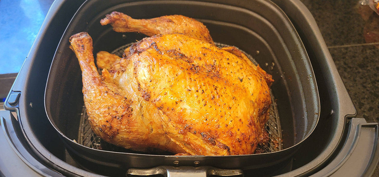 Can an air fryer replicate rotisserie chicken? Seventy minutes at 375 degrees comes pretty darn close. (Jennifer Bardsley)