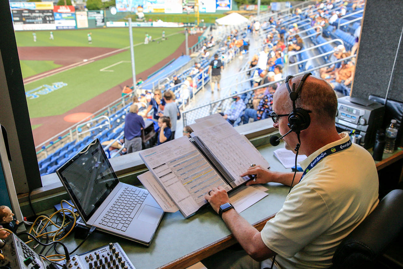 Pat Dillon, AquaSox broadcaster, during the game Wednesday afternoon at Funko Field in Everett on July 28, 2021. (Kevin Clark / The Herald)
