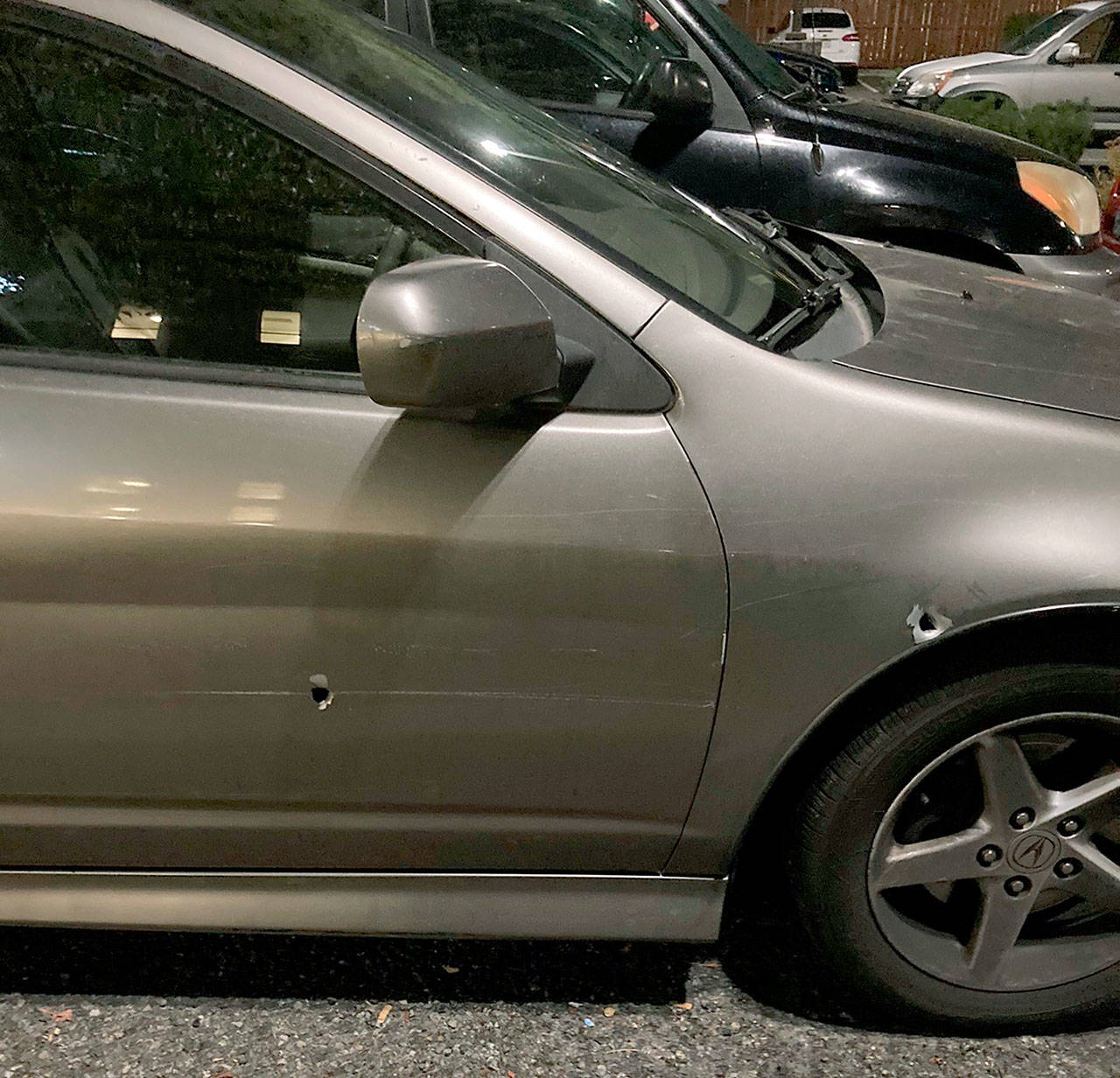 A man was shot Tuesday while driving on I-5 through Lynnwood, according to Washington State Patrol. This is his vehicle, with two bullet holes visible. (Washington State Patrol)