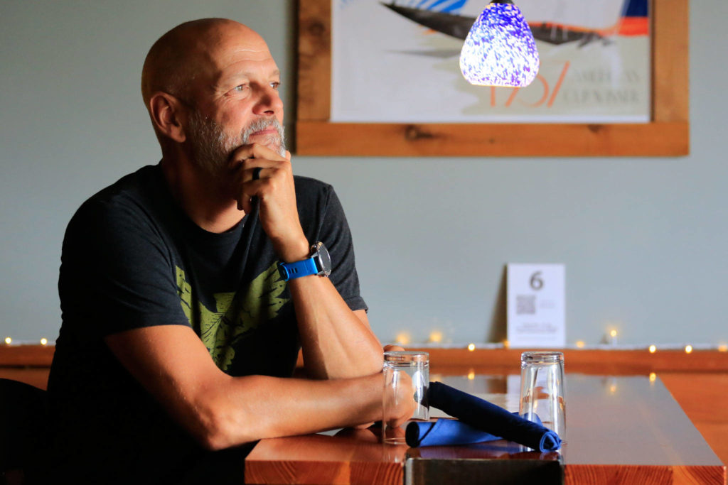 John Lundin, owner of Bluewater Organic Distilling in Everett. (Kevin Clark / The Herald)
