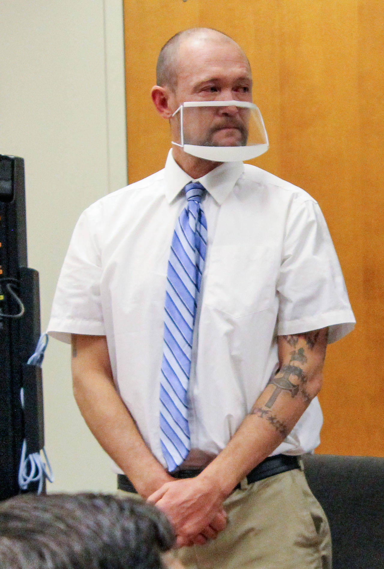 Kyle Wheeler listens as he is convicted of second-degree manslaughter in Snohomish County Superior Court on Thursday in Everett. (Ellen Dennis / The Herald)