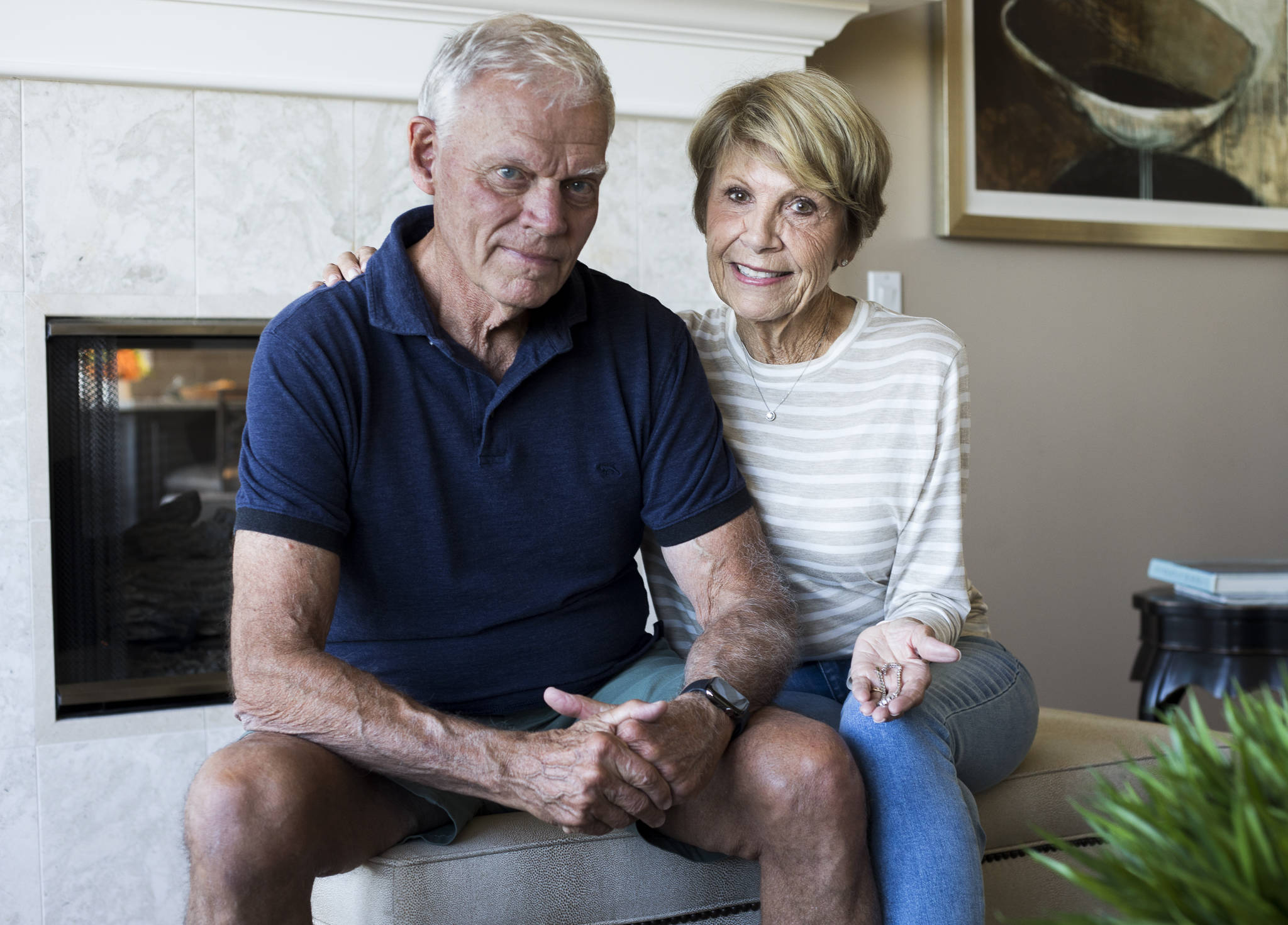 Neal and Colleen Baum with one of her two diamond tennis bracelets that were accidentally thrown out at their home in Edmonds and recovered from five tons of trash. (Olivia Vanni / The Herald)