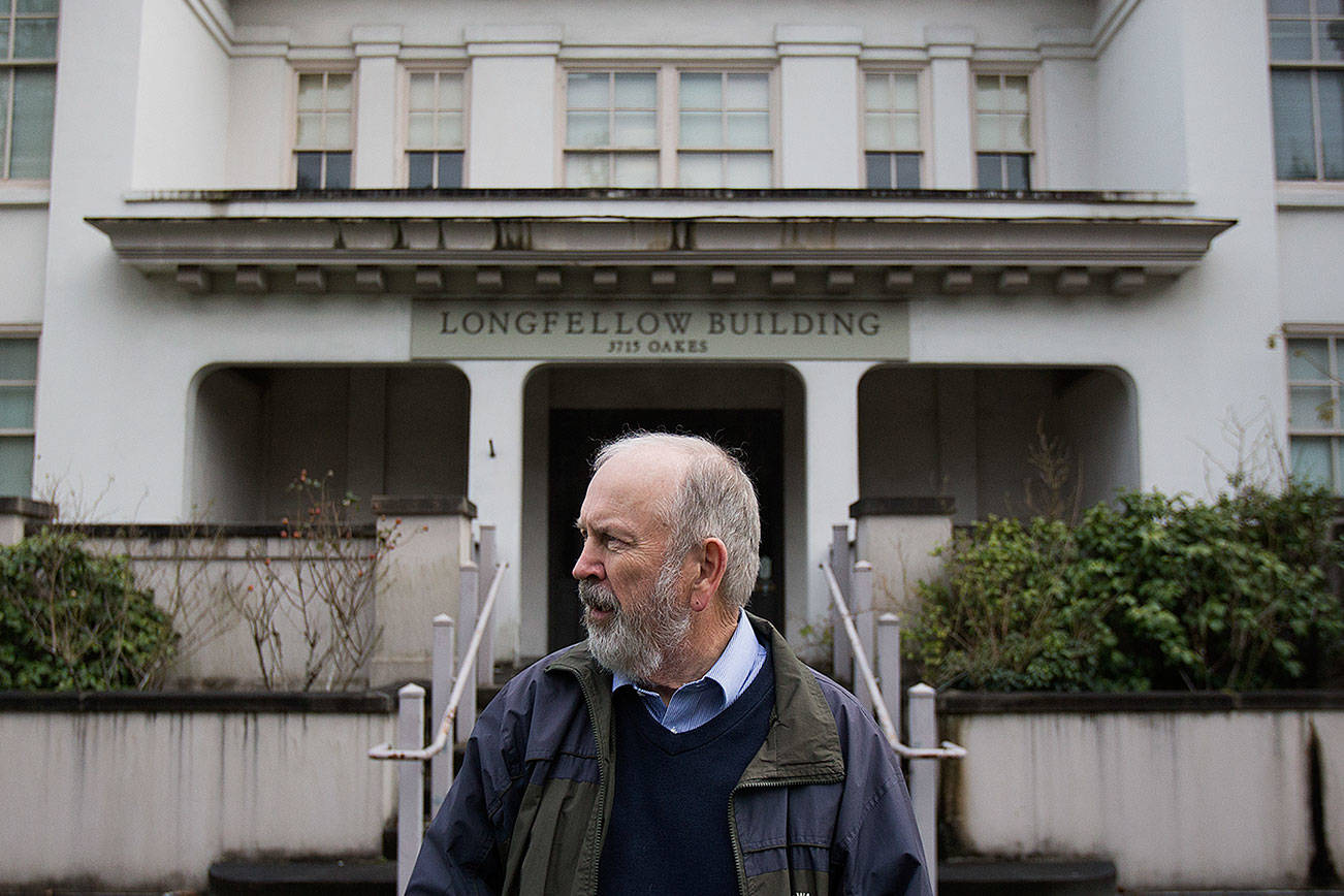 Outside Everett's old Longfellow Elementary School building in 2016, local historian Jack O'Donnell recalled his time attending the school in the 1950s. The Longfellow building, where Henry M. Jackson attended school, is now listed on the National Register of Historic Places. (Andy Bronson / The Herald)