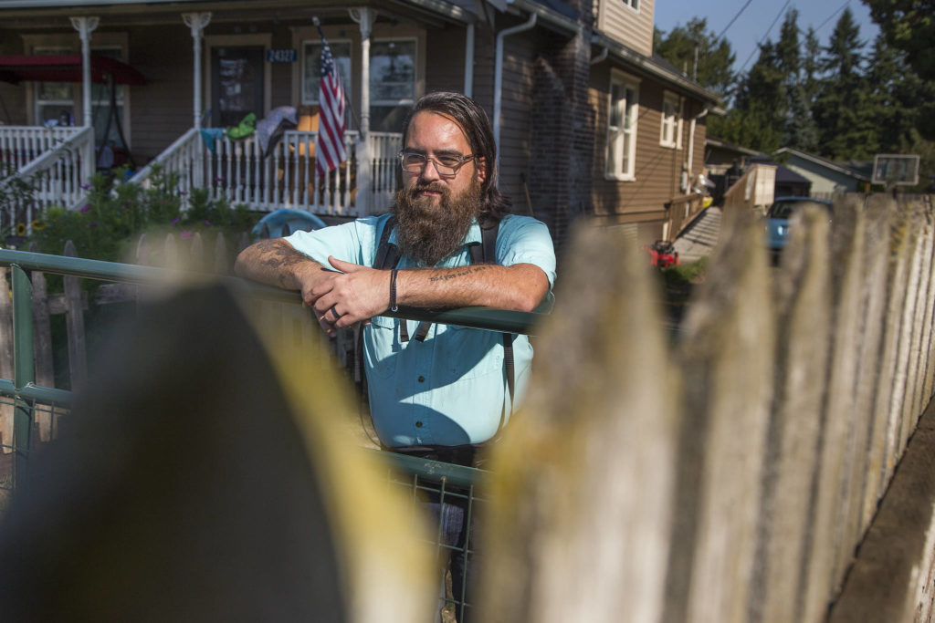 Jasan Winship, a data administrator with Volunteers of America, talks about his life after a couple of accidents that led to him feeling like a burden to his family, Tuesday in Sedro-Woolley. (Andy Bronson / The Herald)
