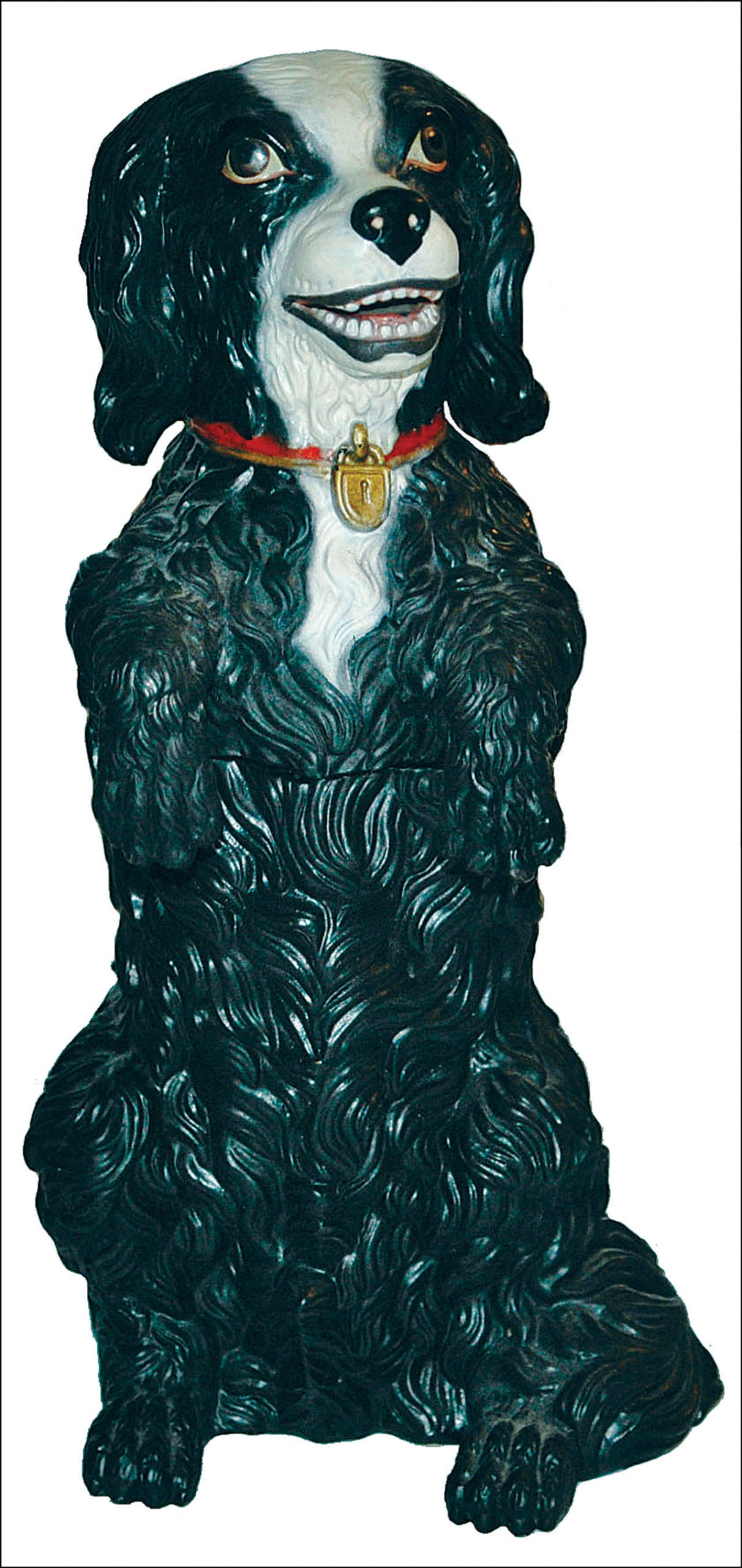 The terra cotta tobacco jar by Jon Maresch, shaped like a smiling black dog, is marked JM#116 and sold at Fox Auctions for $240. (Cowles Syndicate Inc.)