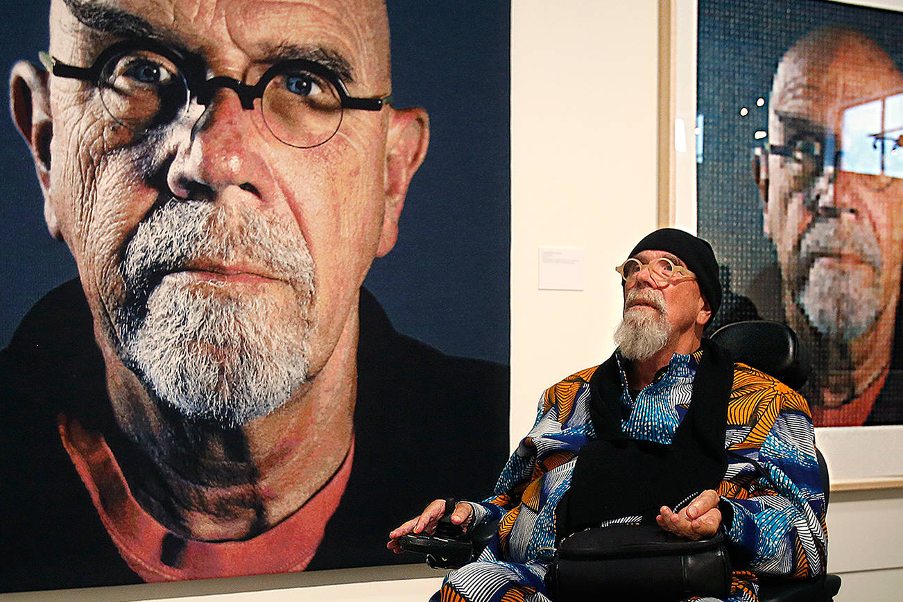 Dan Bates / The Herald
Renowned artist Chuck Close takes in his works during a 2016 exhibit at the Schack Art Center in Everett.