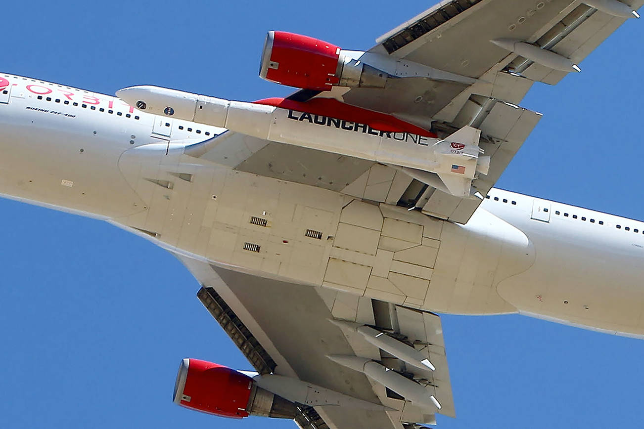 Virgin Orbit Boeing 747-400 rocket launch platform, named Cosmic Girl, takes off from Mojave Air and Space Port, Mojave (MHV) on its second orbital launch demonstration in the Mojave Desert, north of Los Angeles. (AP Photo/Matt Hartman)