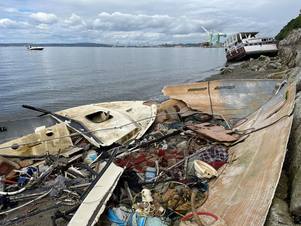 Two derelict boats near Howarth Park in Everett, along the railroad breakwater south of the Port of Everett. (Chuck Taylor / The Herald) 

