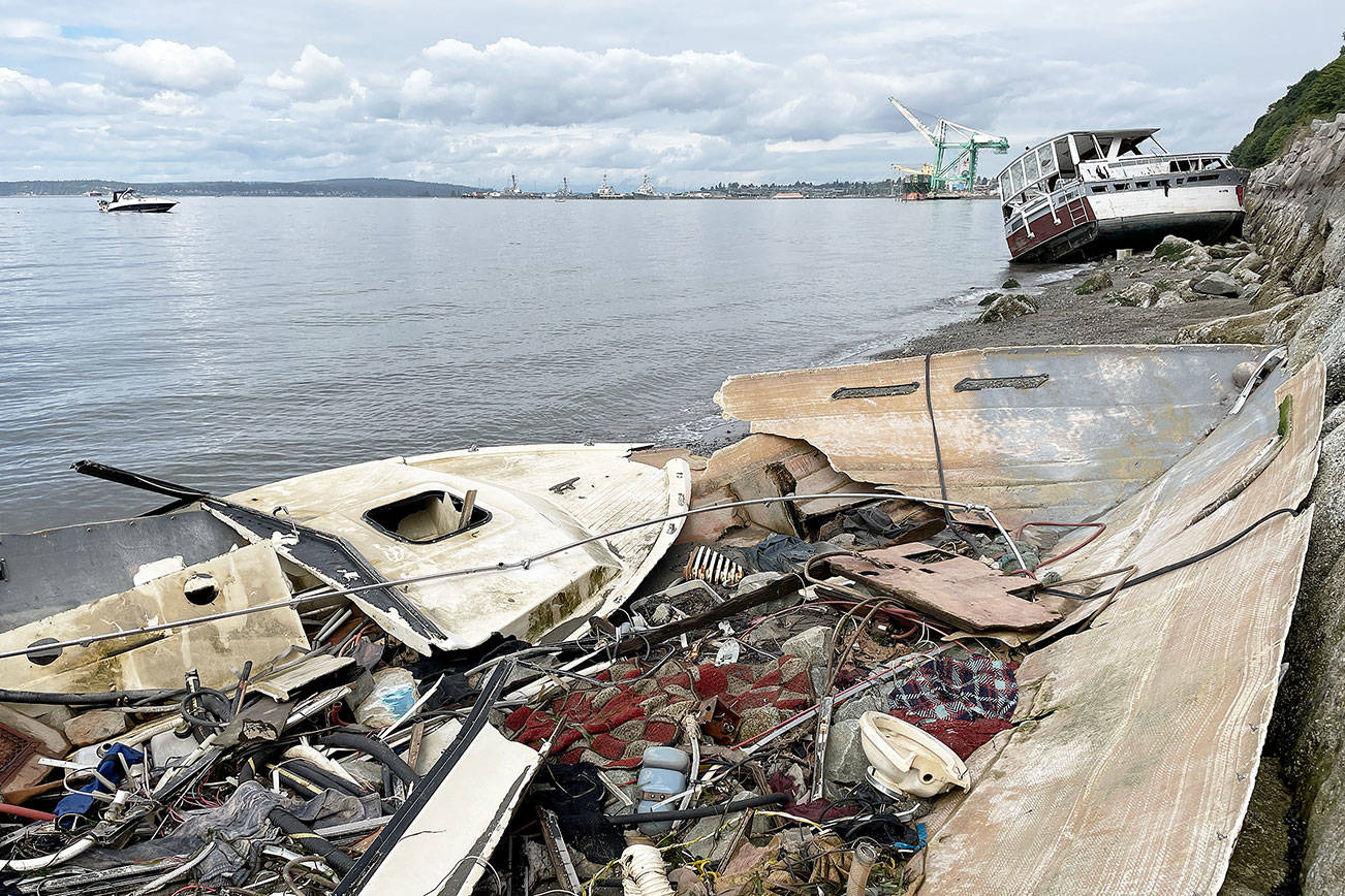 Two derelict boats near Howarth Park in Everett, along the railroad breakwater south of the Port of Everett. (Chuck Taylor / The Herald) 20210827