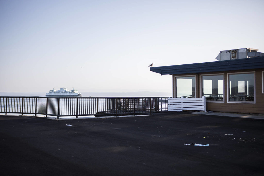 Ivar’s restaurant tables and chairs have been removed from a “parklet” in Mukilteo — the site of the former ferry ramp, which is owned by the Port of Everett. (Olivia Vanni / The Herald)
