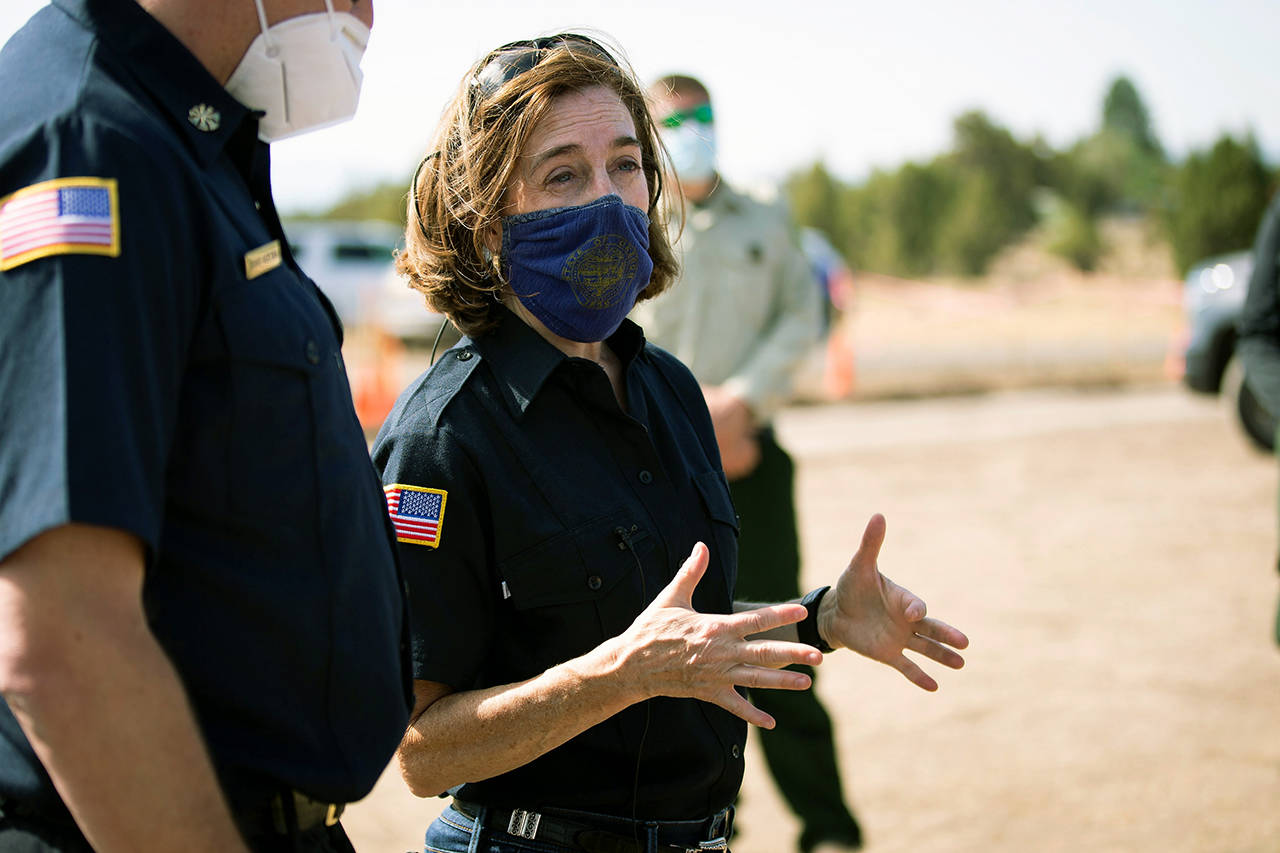 Oregon Gov. Kate Brown, seen here June 28, said people in Oregon, regardless of vaccination status, will be required to wear masks in most public outdoor settings. (Arden Barnes/The Herald And News via AP, File)