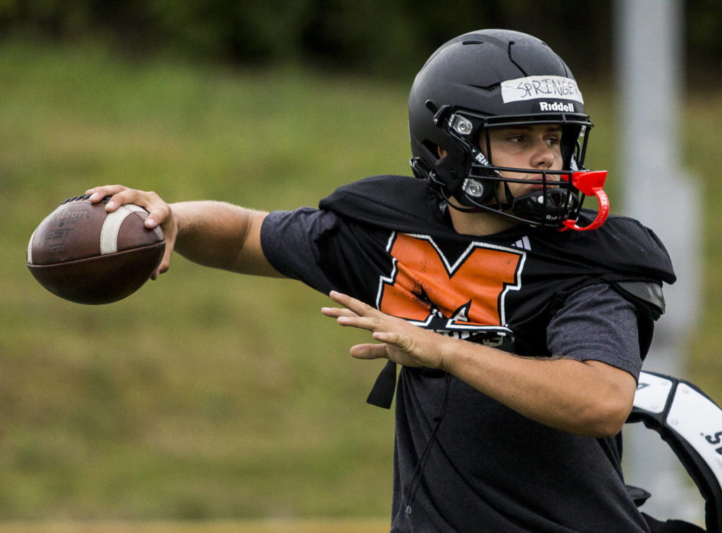 Blake Springer throws a pass during football practice on Thursday, Aug. 26, 2021 in Monroe, Wash. (Olivia Vanni / The Herald)
