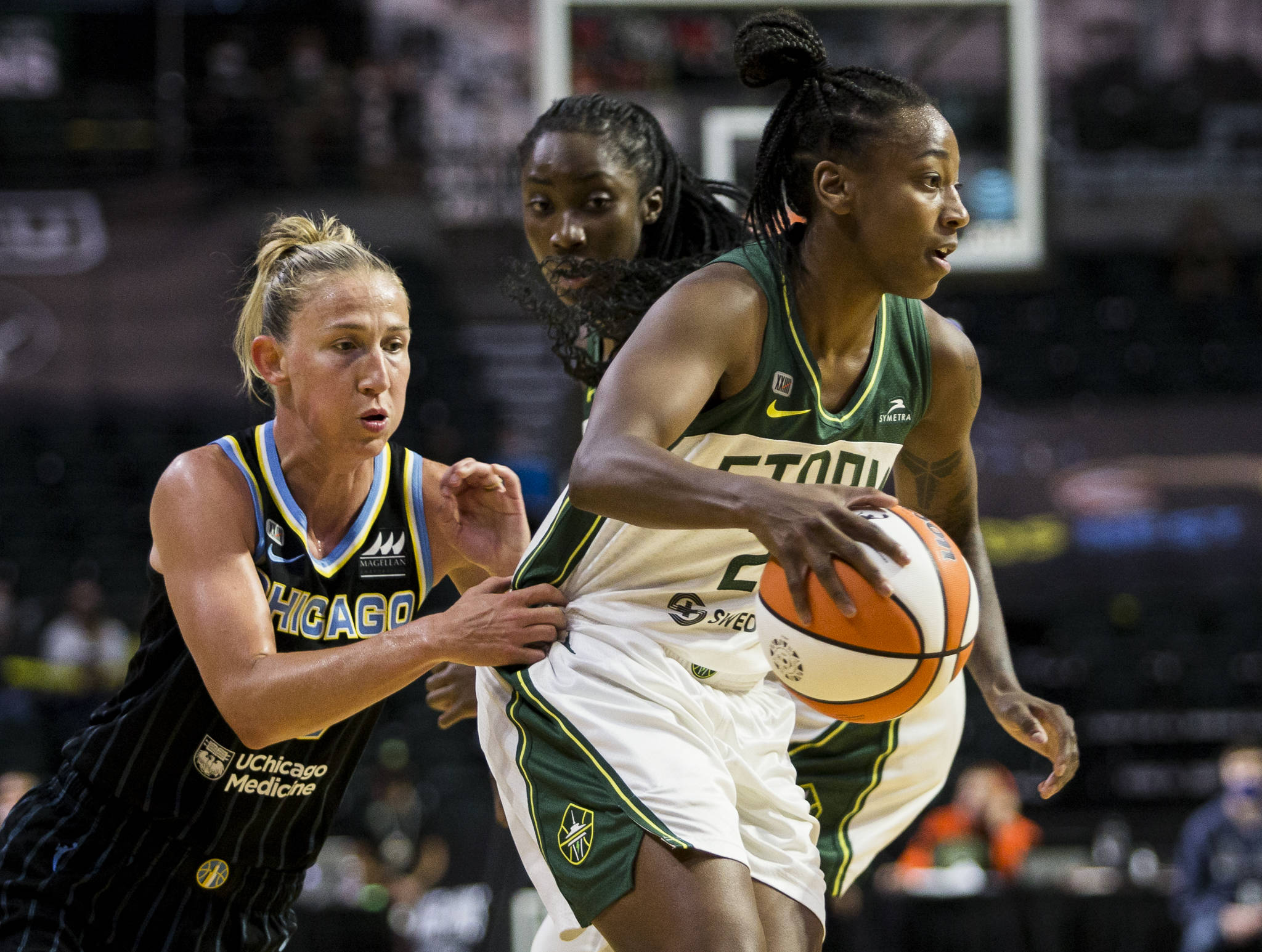 Seattle Storm’s Jewell Loyd has her jersey grabbed by at Chicago Sky’s Courtney Vandersloot during the game at Angel of the Winds Arena on Friday, Aug. 27, 2021 in Everett, Wash. (Olivia Vanni / The Herald)