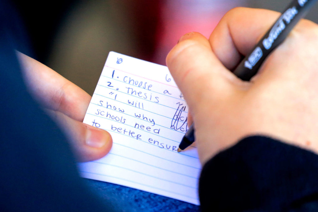 Notes are taken during a public speaking clinic for the newly formed Marysville Youth Advocacy Committee. (Kevin Clark / The Herald)

