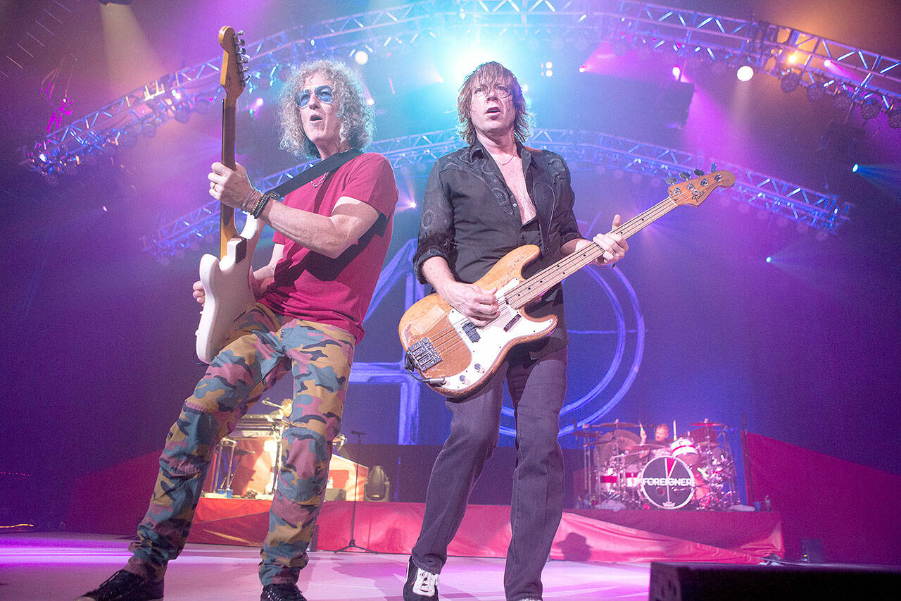 Bruce Watson (left) and Jeff Pilson of Foreigner will take the stage when the rock band performs Sept. 14 at Angel of the Winds Arena in Everett. (Associated Press)
