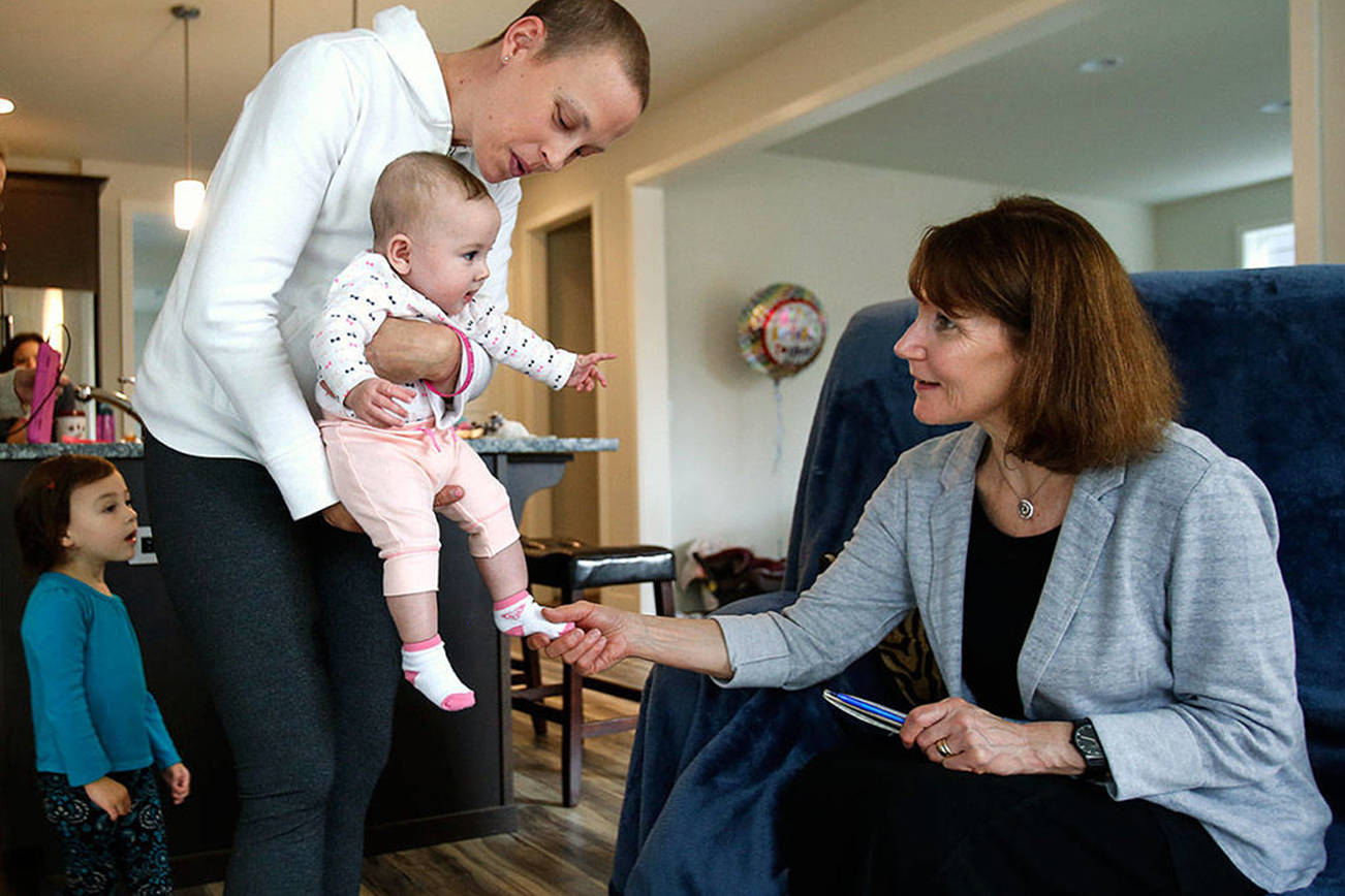 In June of 2016, Apryl DeBroeck Roberts, followed by her 2-year-old daughter Charlee, brings baby Haven to meet Julie Muhlstein. (Dan Bates / Herald file)