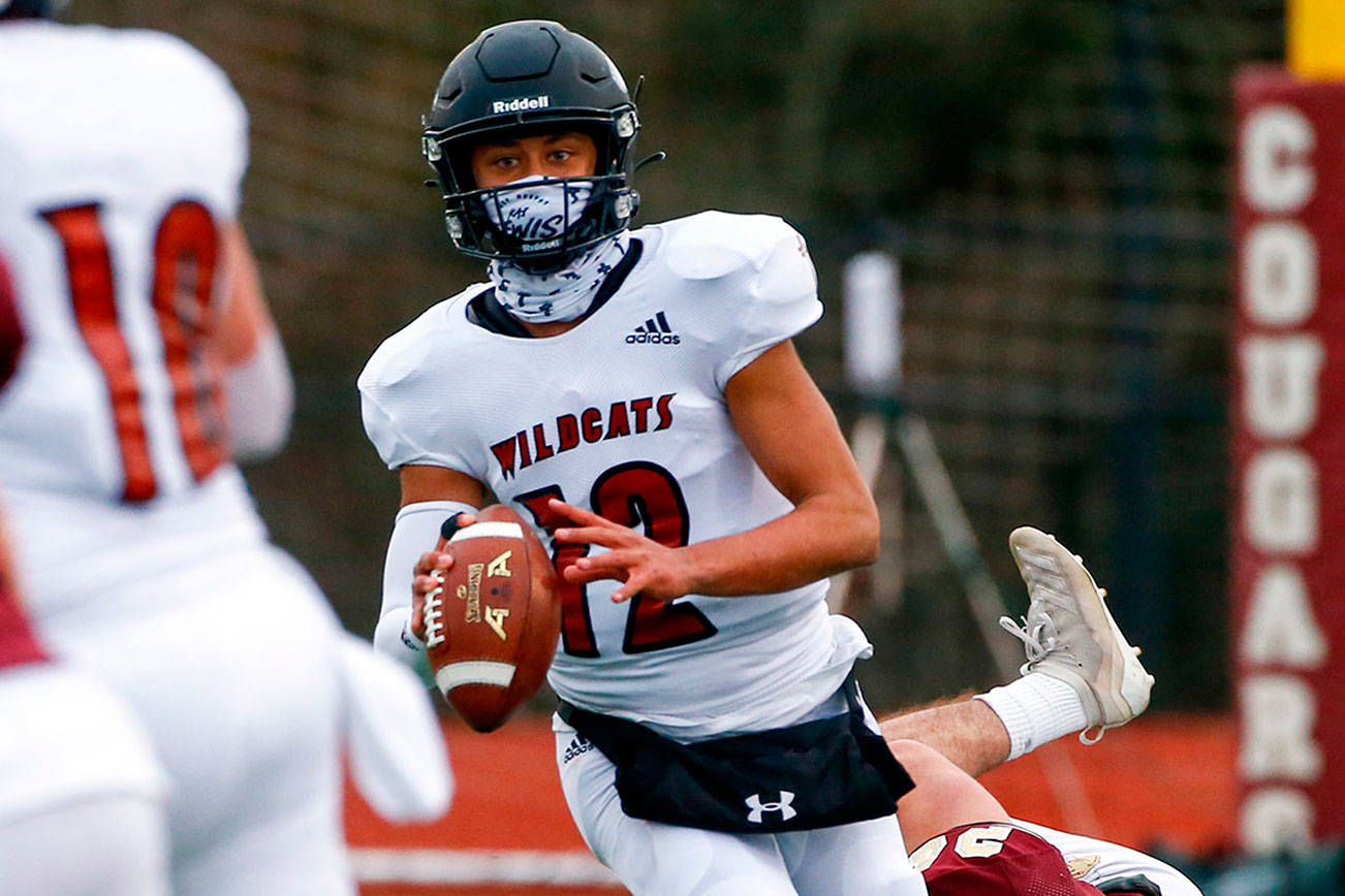 The Lakewood Cougars defeated the Archbishop Murphy Wildcats 32-21 at Lakewood High Friday night in Arlington on March 26, 2021. (Kevin Clark / The Herald)