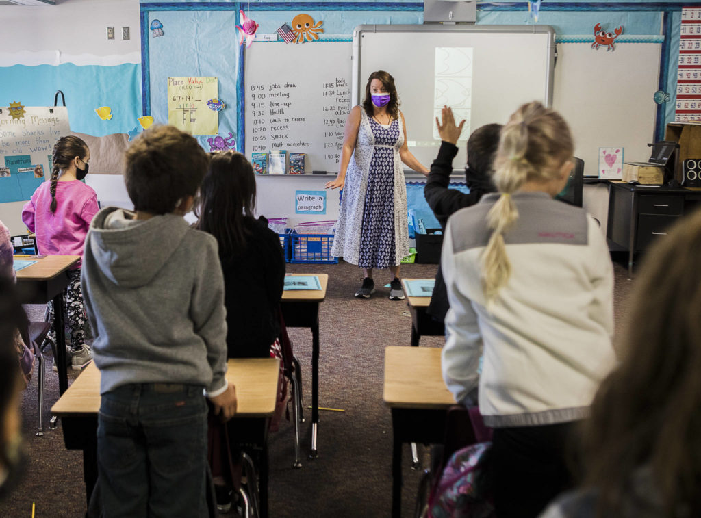 Laura Decker talks to her second grade class on the first day of school at Mountain Way Elementary on Wednesday in Granite Falls. (Olivia Vanni / The Herald)
