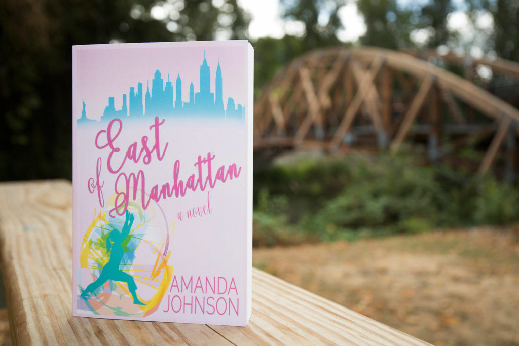 Mountlake Terrace writer Amanda Johnson’s first book, “East of Manhattan,” is inspired partly by her life.(Andy Bronson / The Herald)
