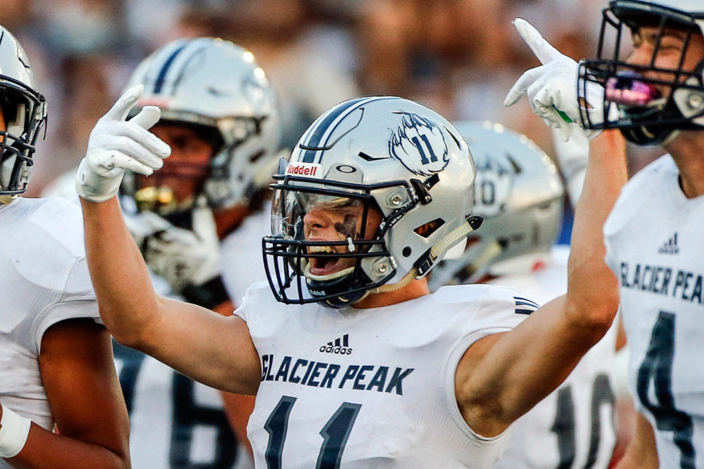 Glacier Peak’s Jadon Claps celebrates a defensive stop against Snohomish Friday night at Veteran’s Memorial Stadium in Snohomish September 3, 2021. (Kevin Clark / The Herald)
