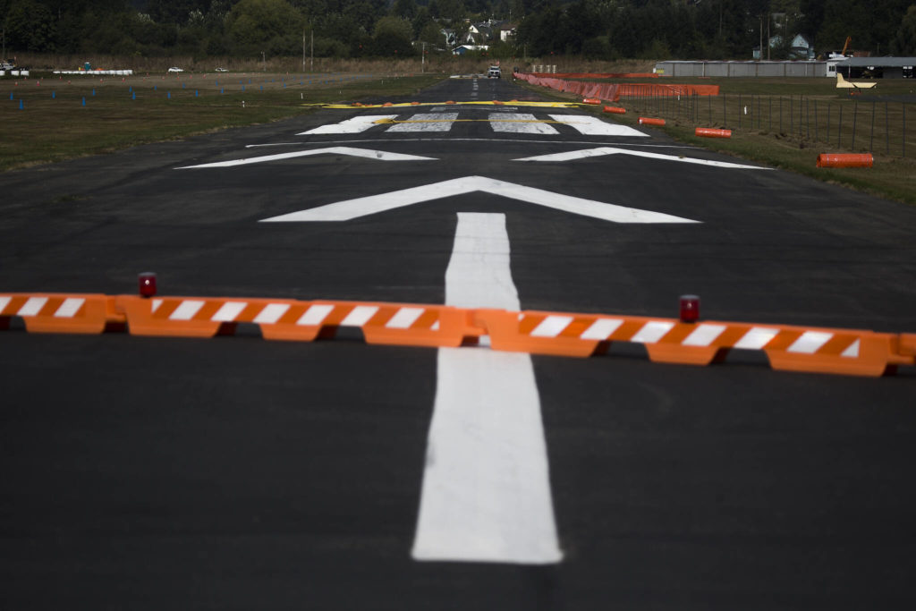 The main asphalt runway at Harvey Airfield in Snohomish is closed for repaving. (Andy Bronson / The Herald)
