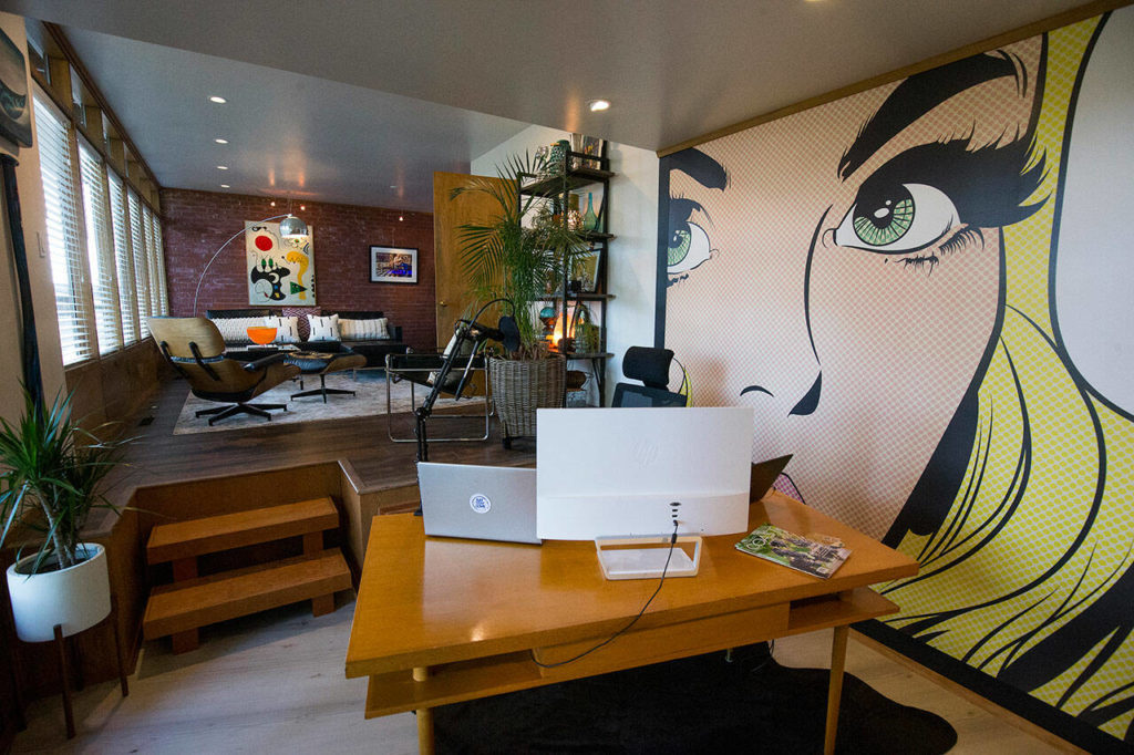 A Roy Lichtenstein mural is displayed in Wendy Poischbeg‘s home office. (Andy Bronson / The Herald)
