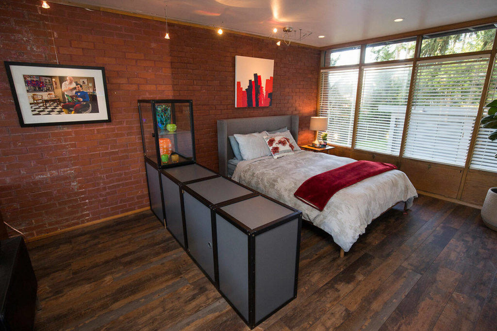 The master bedroom was expanded after Wendy and Matt Poischbeg removed built-in closets. (Andy Bronson / The Herald)
