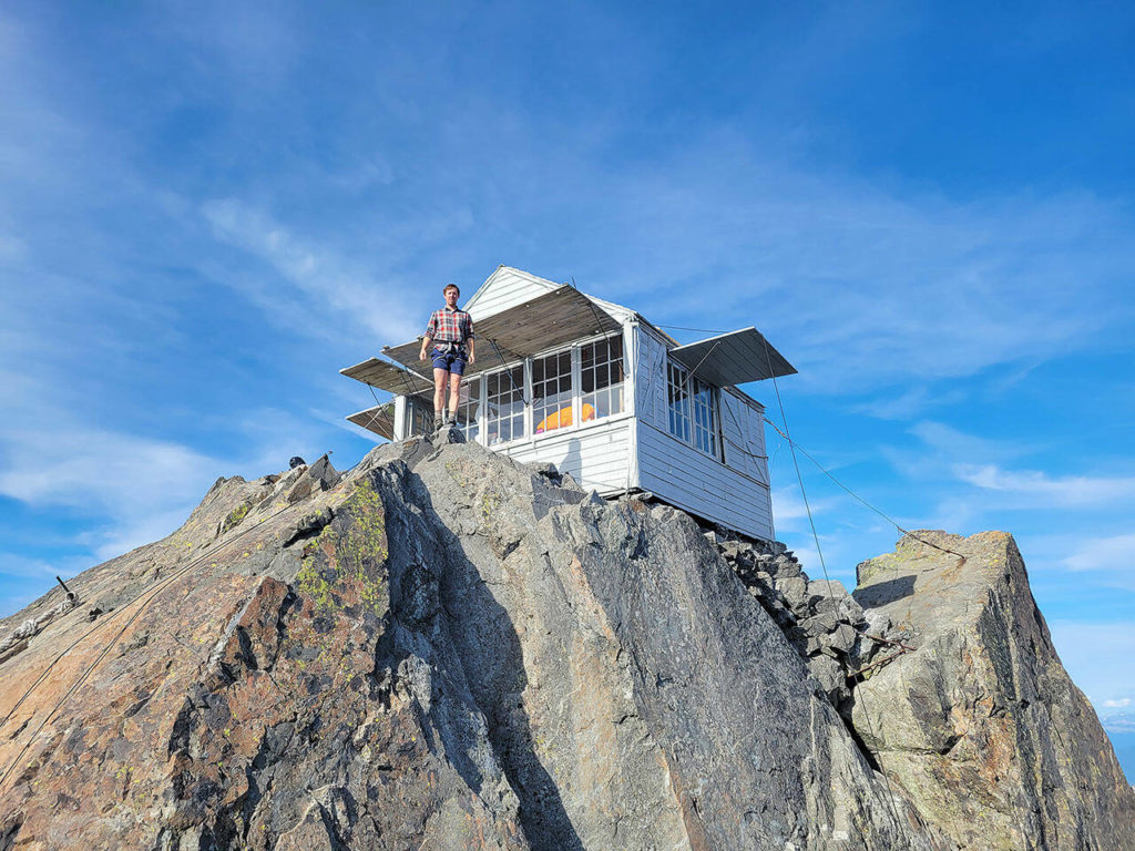 Zach Graham stands in front of Three Fingers Lookout. (Friends of Three Fingers Lookout)
